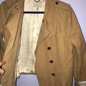 Short to-the-waist trench coat.